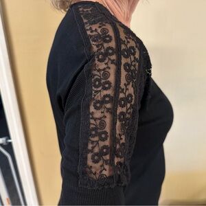 NWT Women’s black  top with lace on shoulders & partial sleeves.